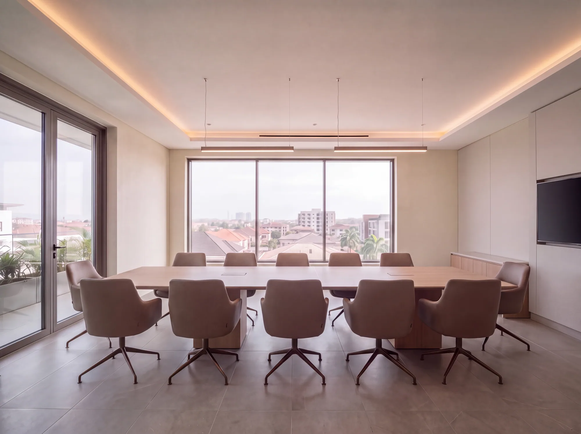 The conference room with a long table and a view over Lekki